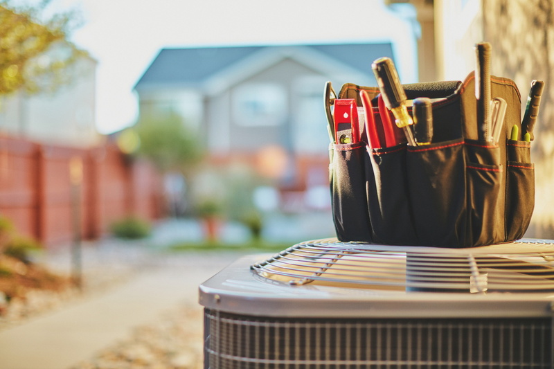 A/C tune-up service by NestWell HVAC technician